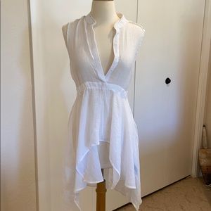 Sheer top or bathing suit cover up